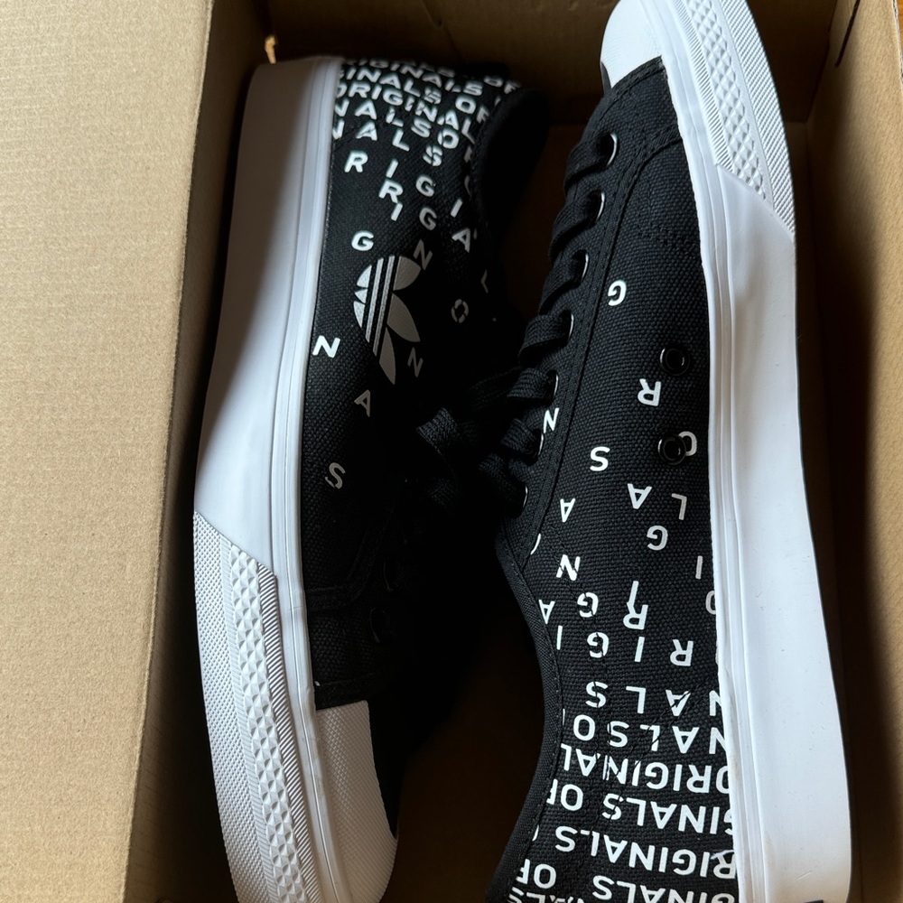 Adidas Black and White Text Sneakers